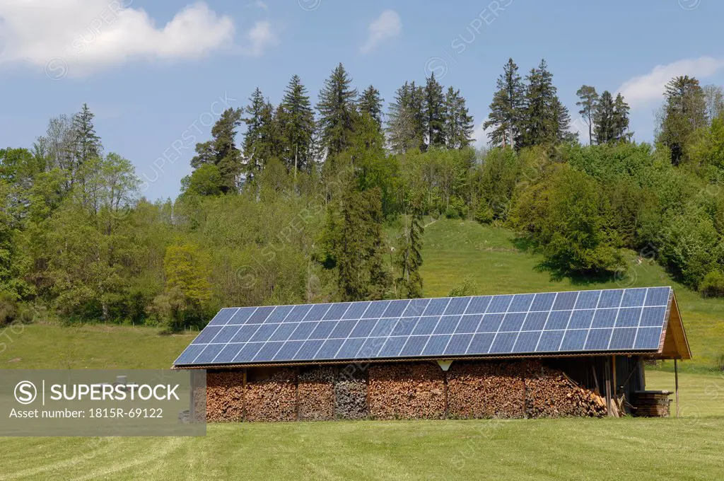 Germany, Bavaria, Wood shack with solar cell roof