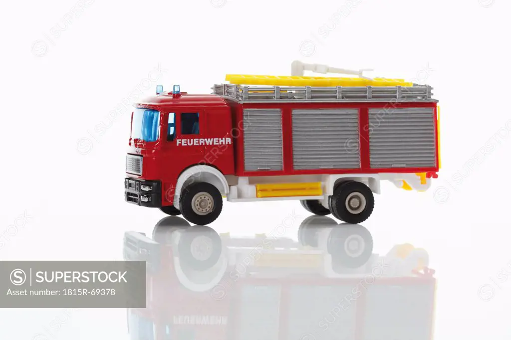 Toy fire truck on white background