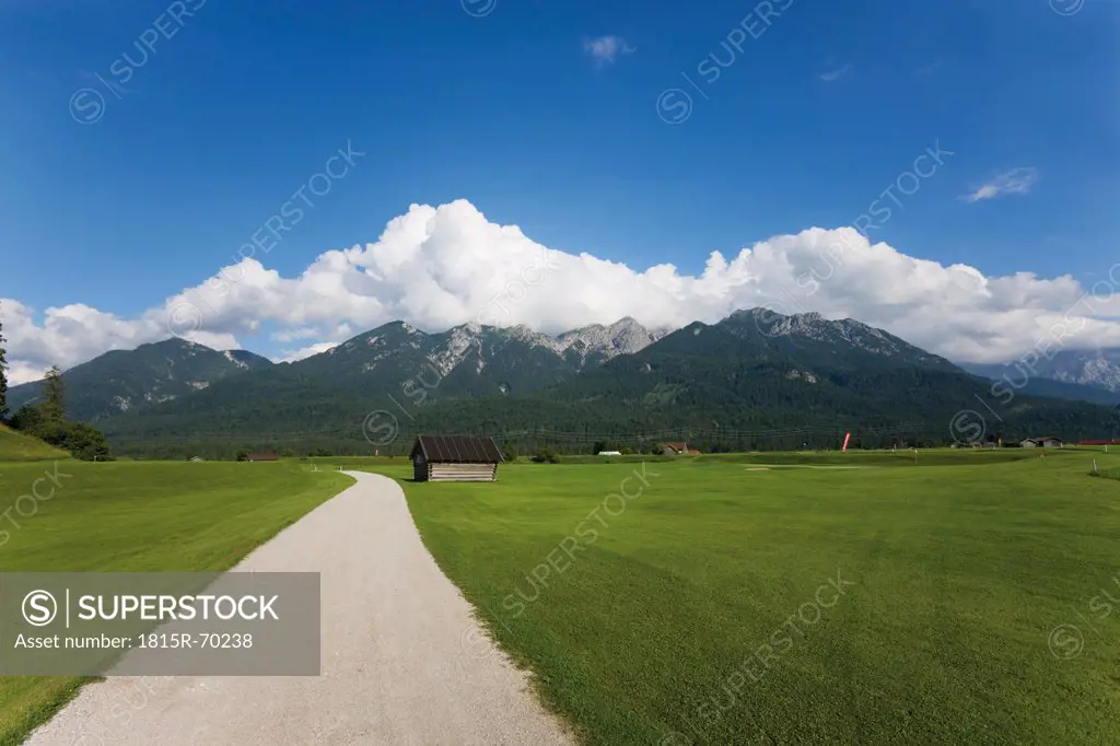 Germany, Bavaria, View of empty track with karwendel mountains in background