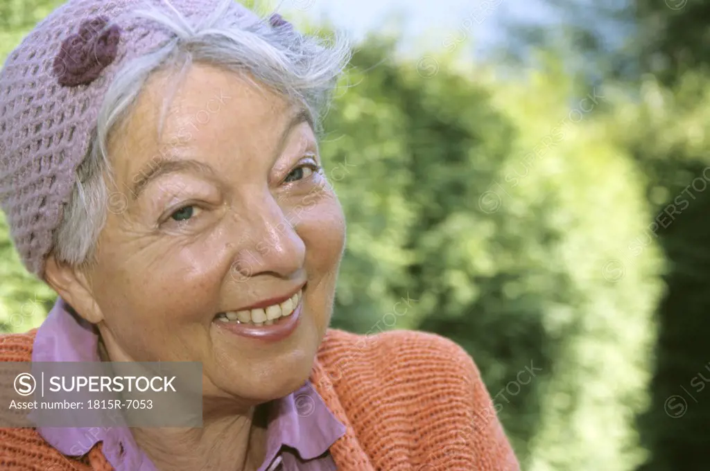 Senior woman smiling, close up