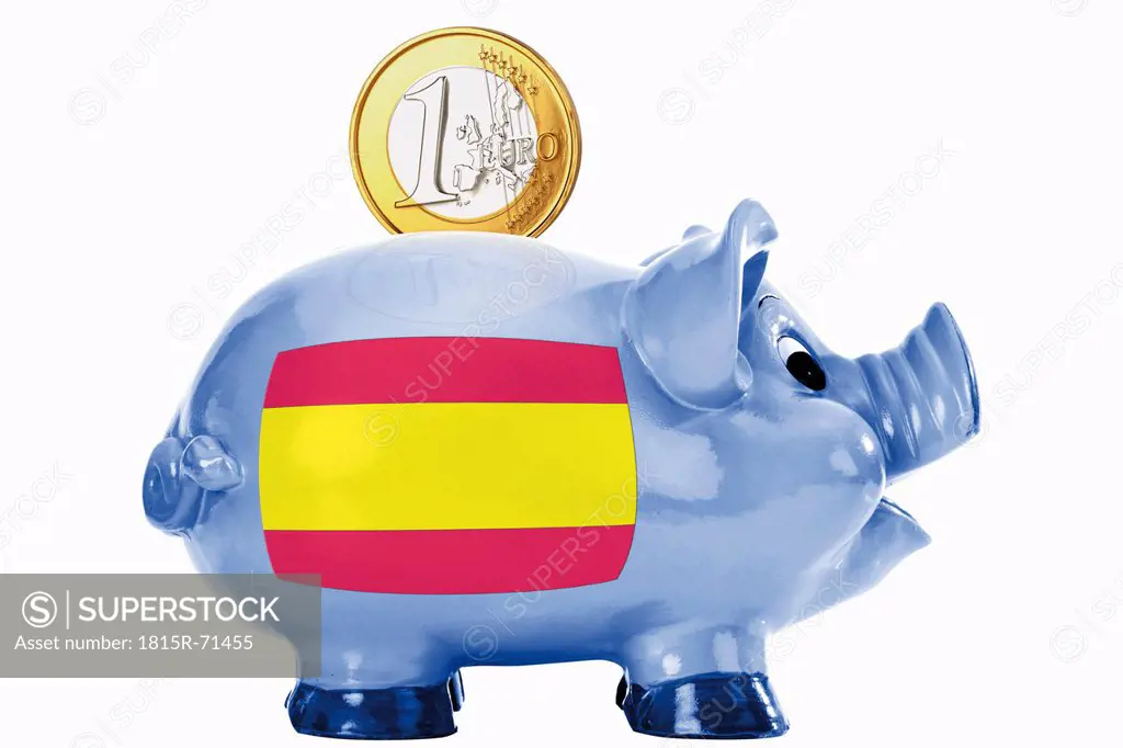 Piggy bank with 1 euro coin and spanish flag