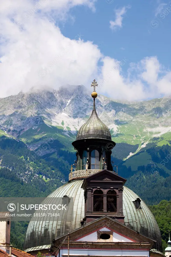 Austria, Tyrol, Innsbruck, View of Mariahilfkirche with mountains in background