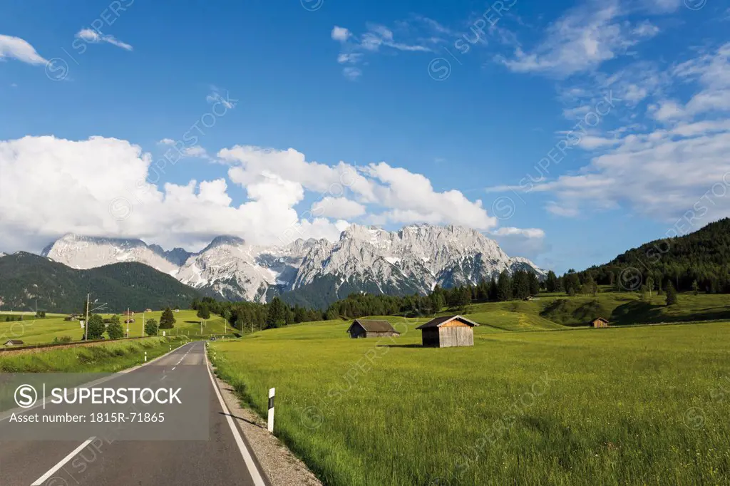 Germany, Bavaria, Empty road with karwendel mountains in background