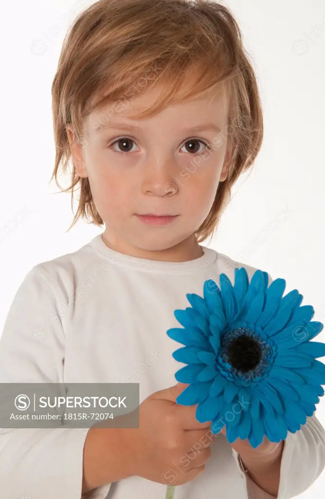 Boy 4_5 holding blue flower, portrait, close_up