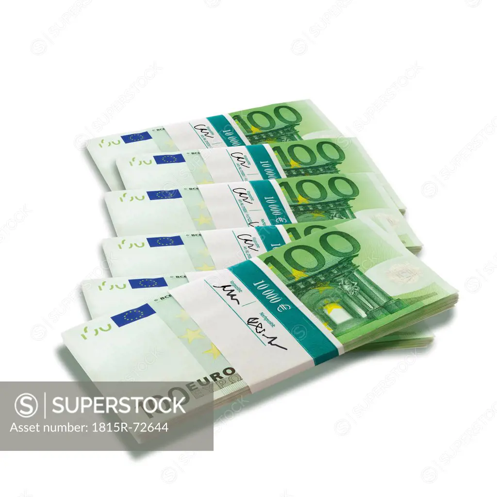 Bunches of 100 Euro notes on white background