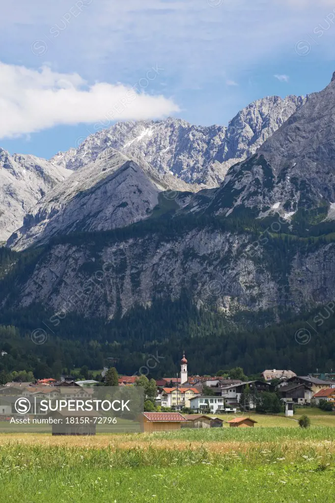 Austria, Tyrol, Mieming, Ehrwald, View of village with mountain ranges