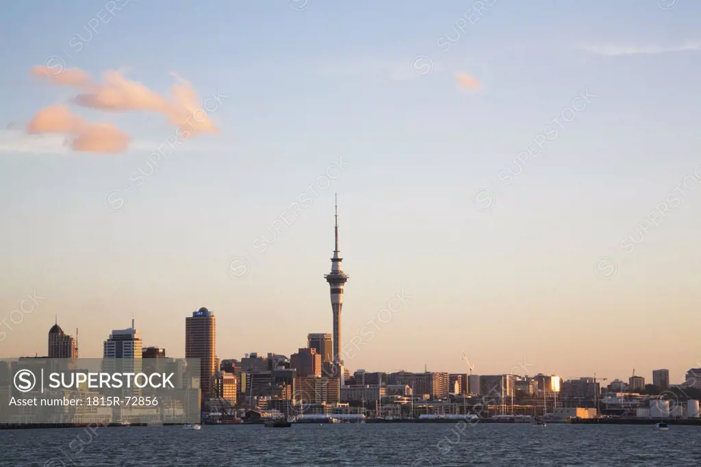 New Zealand, Auckland, North Island, View of city skyline at sunset