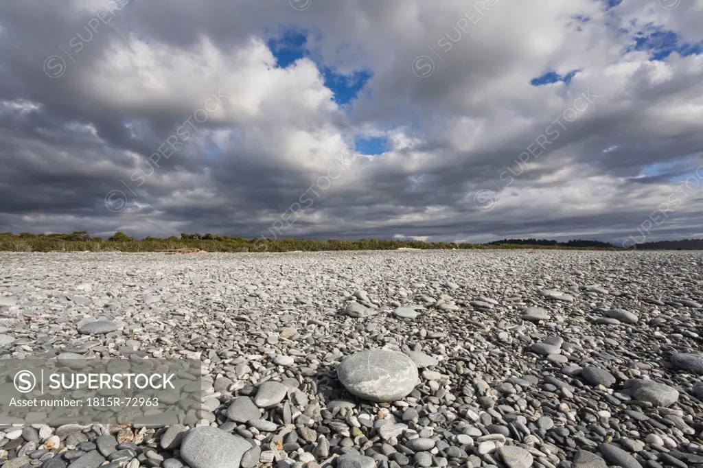 New Zealand, South Island, West Coast, View of Gillespies Beach with stones