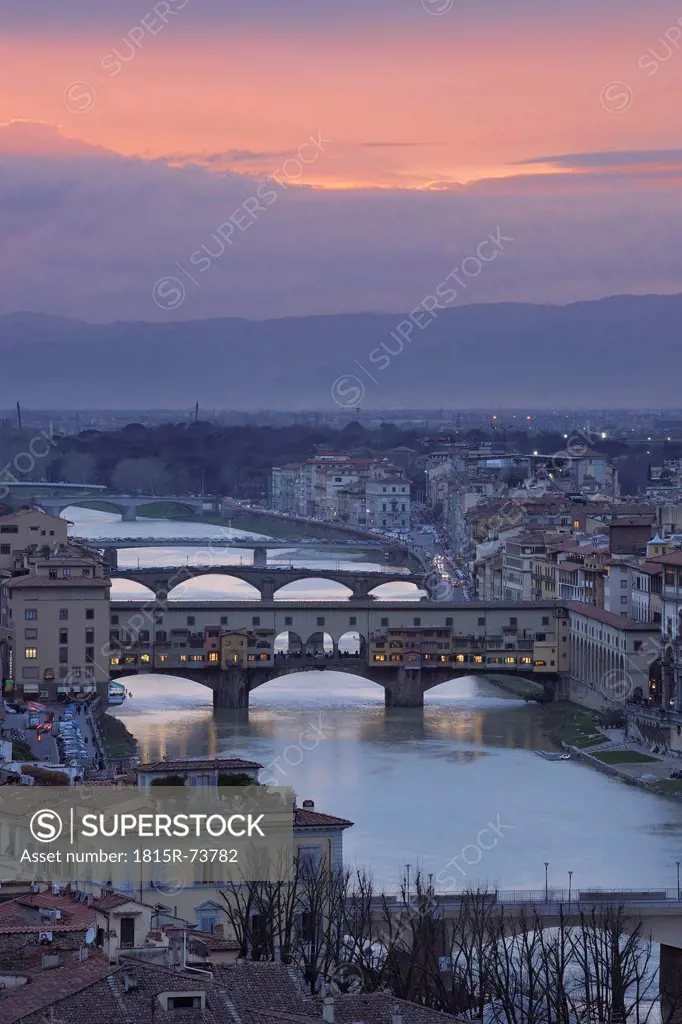 Italy, Tuscany, Florence, View of Bridge on Arno River at dusk