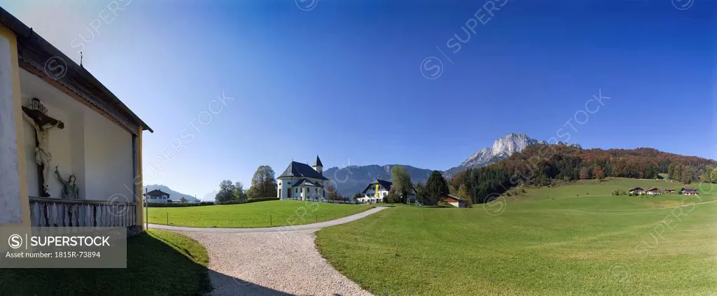 Germany, Bayern, Berchtesgadener Land, View of church with untersberg mountain in background