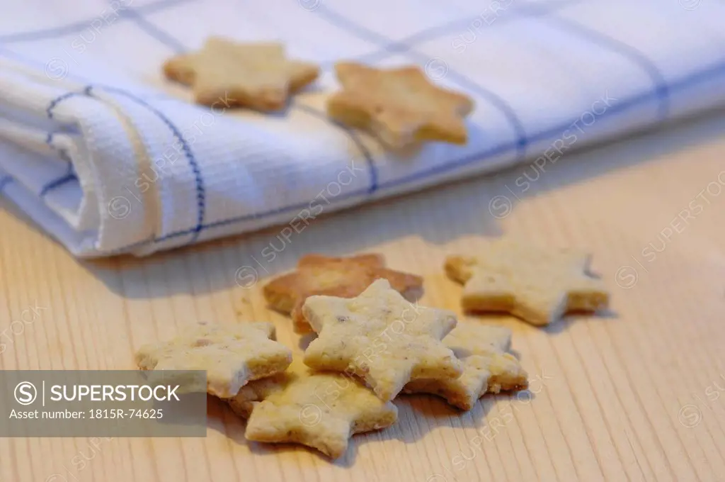Star shape butter cookies with kitchen towel