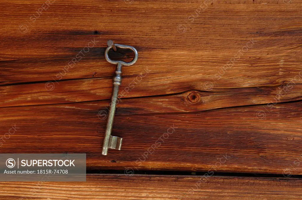 Germany, An old key from nail on wooden shack