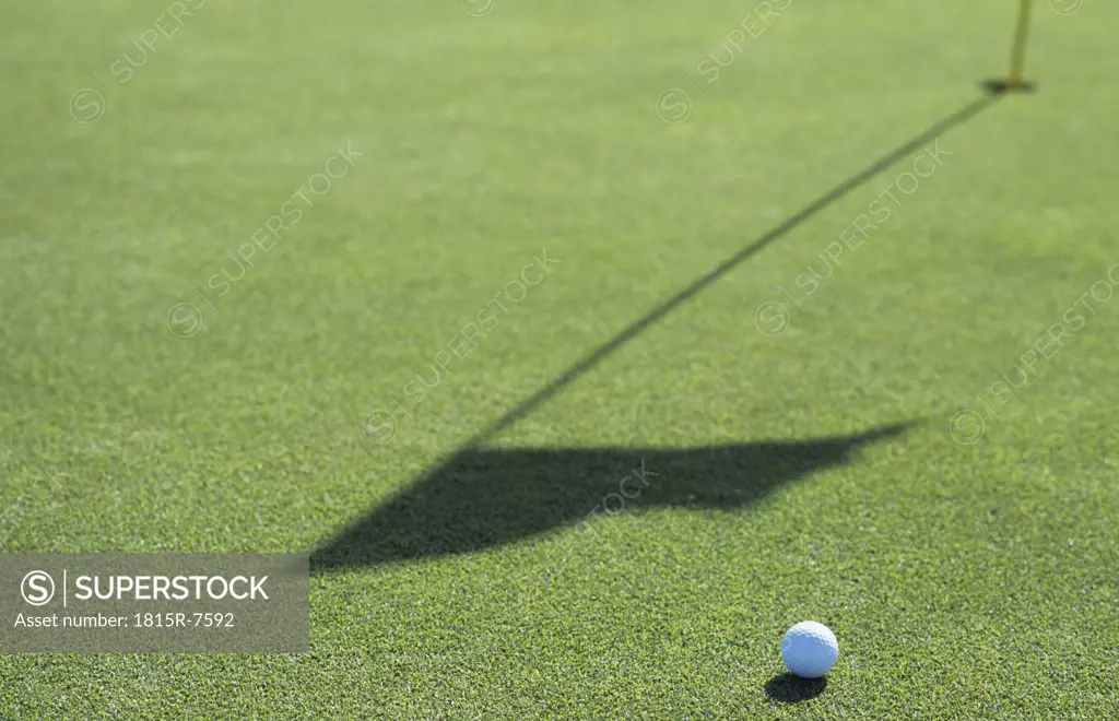 Golf ball on golf course, close-up