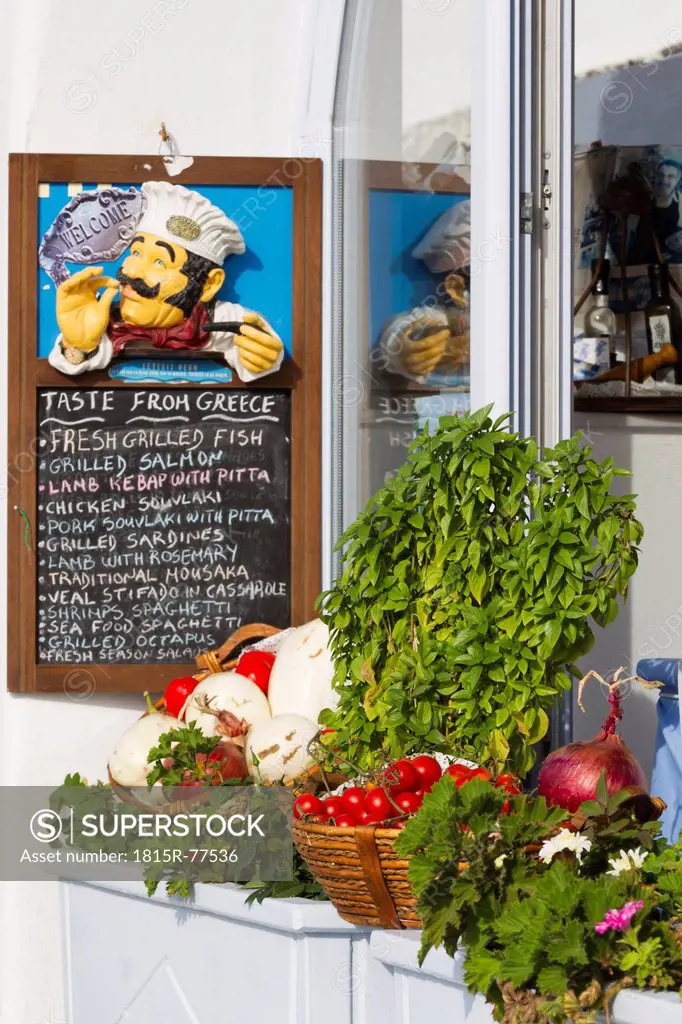 Greece, Cyclades, Thira, Fira, Santorini, Greek retaurant with fresh vegetable outside