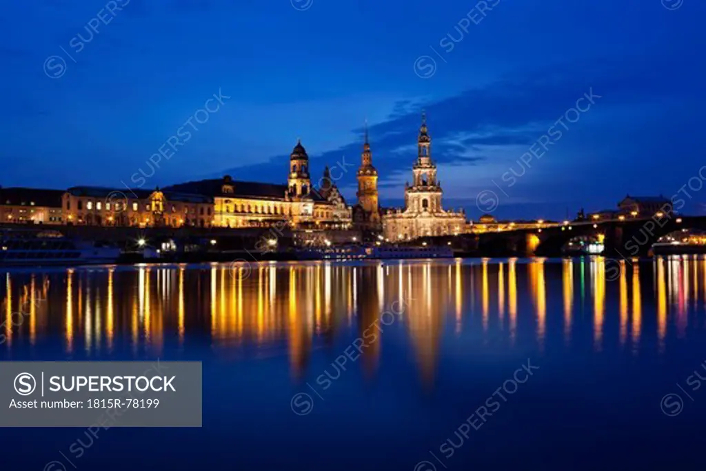 Germany, Saxony, Dresden, View of skyline of Staendehaus, Frauenkirche, Katholische Hofkirche, Semperoper, Bruehl´s Terrace, Dresden Castle and Augustus bridge with Elbe waterfront at night
