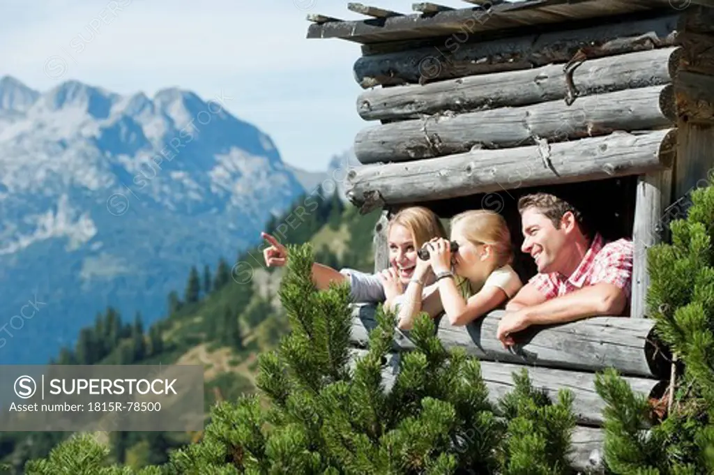 Austria, Salzburg Country, Filzmoos, Family on a hide at alpine
