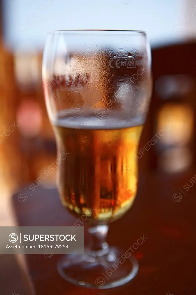 Africa, Cape Verde, Sal, Beer glass in bar, close up