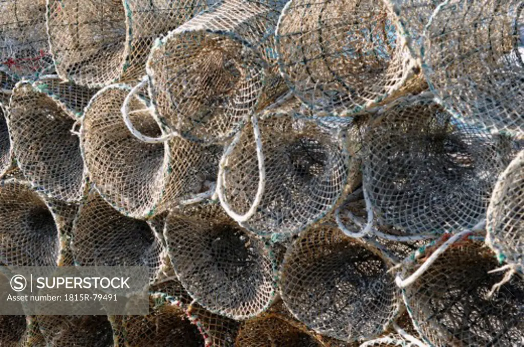 Italy, Sardinia, Cagliari, Stack of fishing nets cages