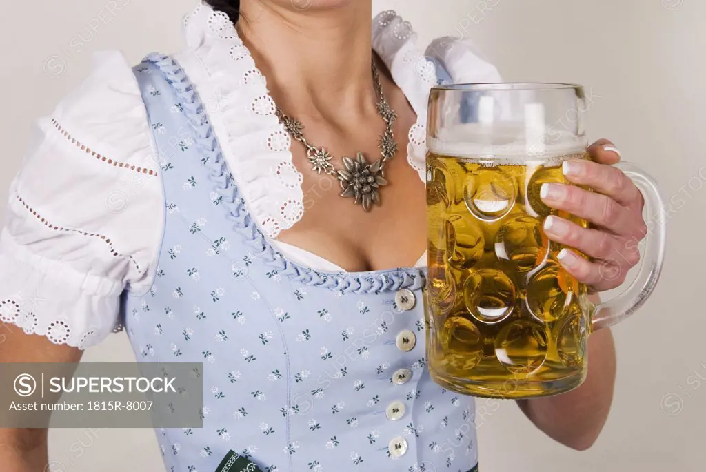 Woman holding beer stein, upper section