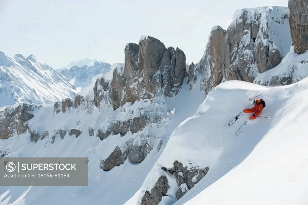 Austria, Kleinwalsertal, Man skiing, elevated view