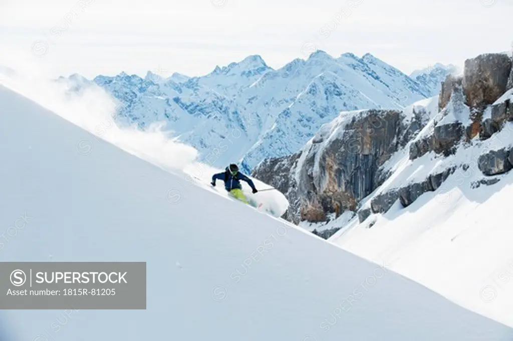 Austria, Kleinwalsertal, Man skiing