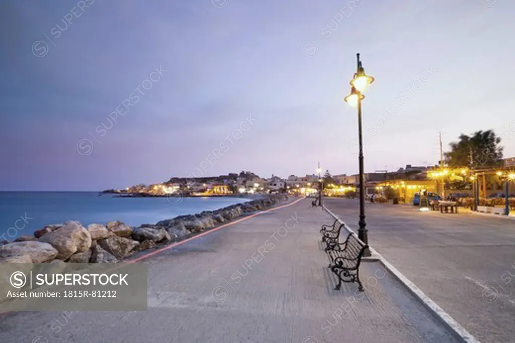 Greece, Crete, Paleochora, View of harbor and city at dusk