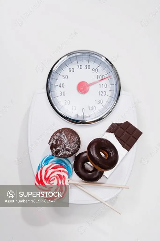 Scale with variety of sweets