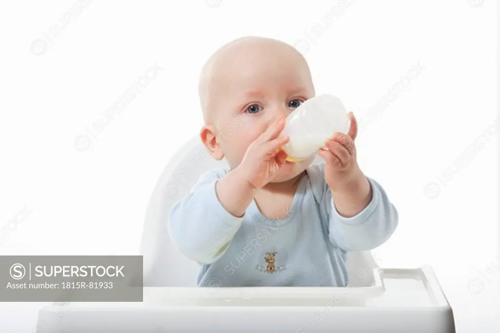Baby boy 6_11 Months drinking milk from milk bottle