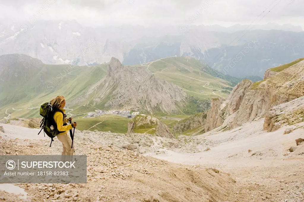 Italy, Dolomites, Mature woman hiking at Pordoi