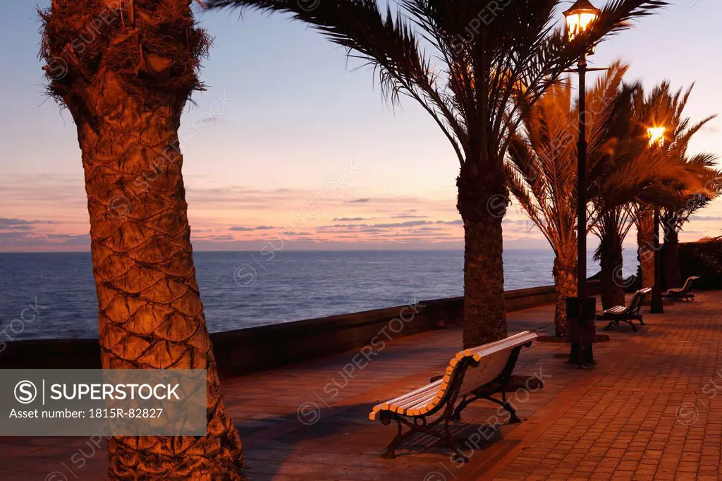 Spain, Canary Islands, La Gomera, La Playa, View of promenade with park bench