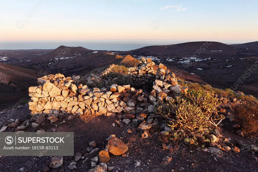 Spain, Canary Islands, Lanzarote, Haria, Risco de Famara, View of top of matos verdes mountain at dusk
