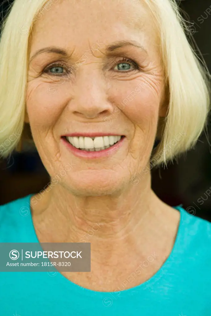 Senior woman smiling, close-up, portrait
