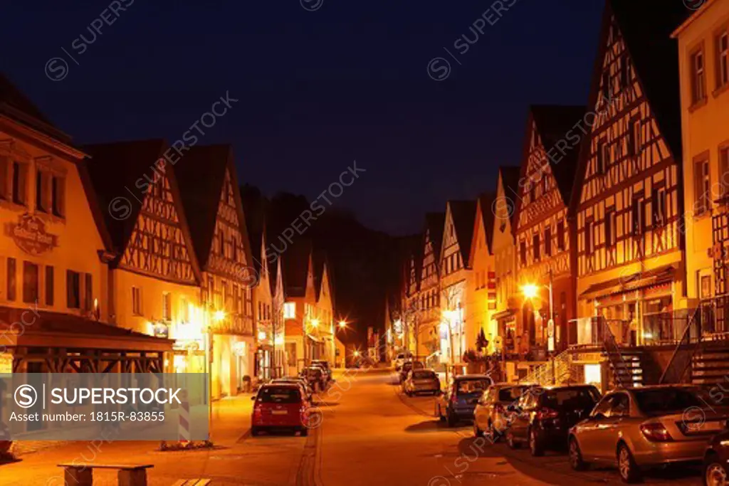 Germany, Bavaria, Franconia, Upper Franconia, Franconian Switzerland, Pottenstein, View of town with timber framed houses at night