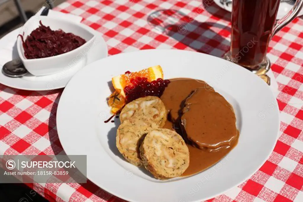 Germany, Bavaria, Franconia, Pottenstein, Close up of marinated beef with dumplings