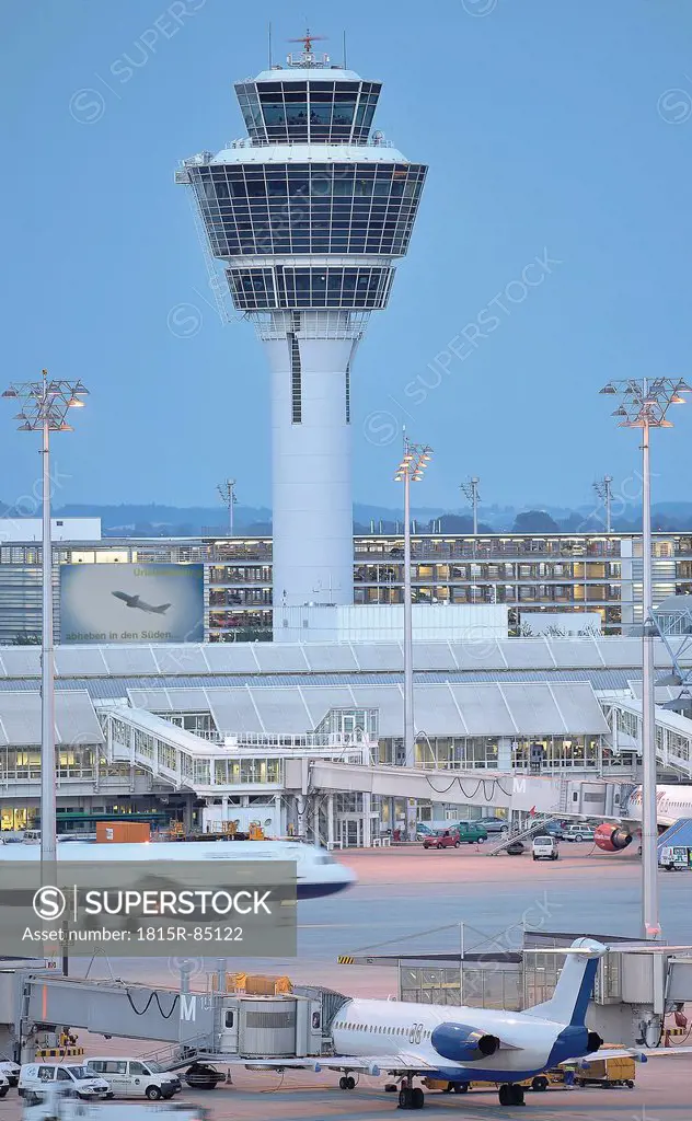 Germany, Munich, Air traffic control tower with airplanes
