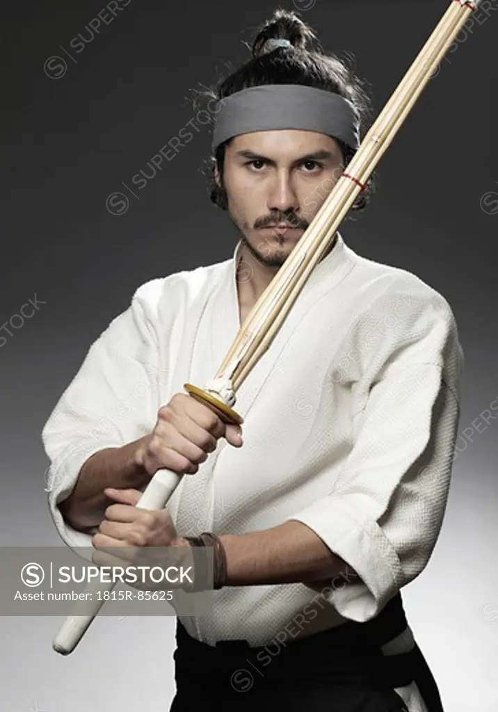 Kendo fighter with bokuto, portrait