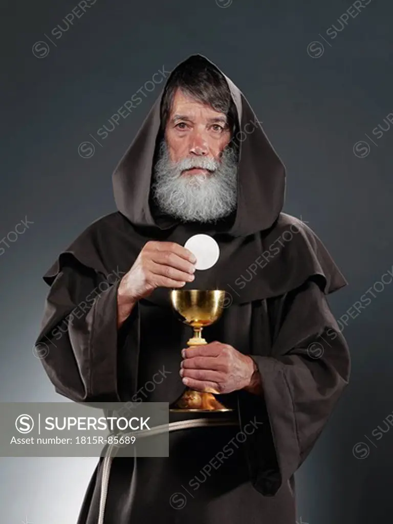 Monk with chalice and host, portrait