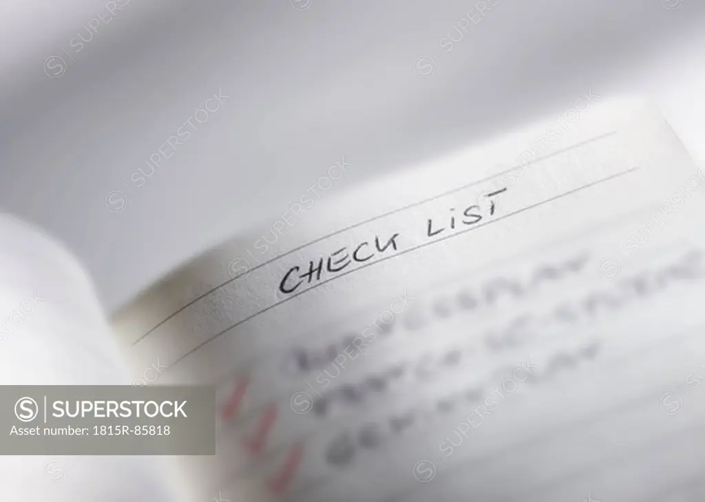 Check list in notebook, close up