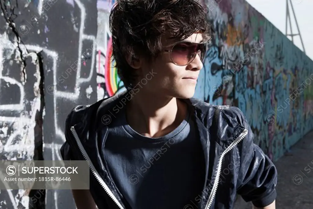 Germany, Berlin, Teenage boy with sunglasses