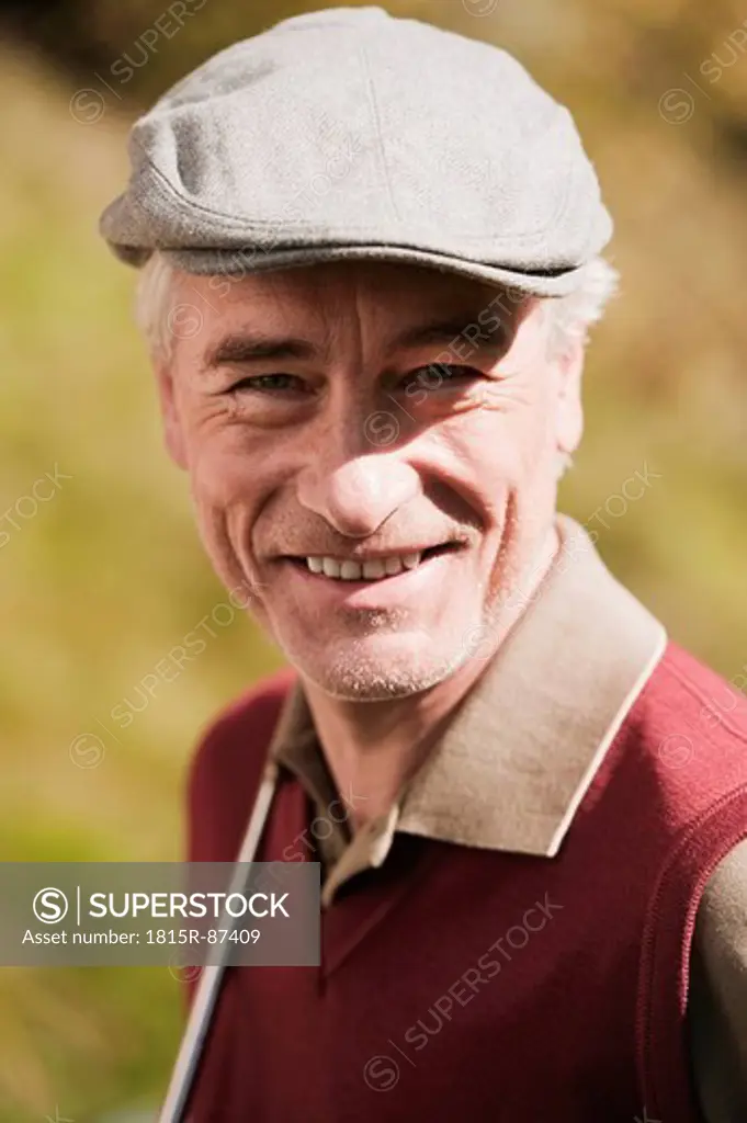 Italy, Kastelruth, Mature man smiling, portrait