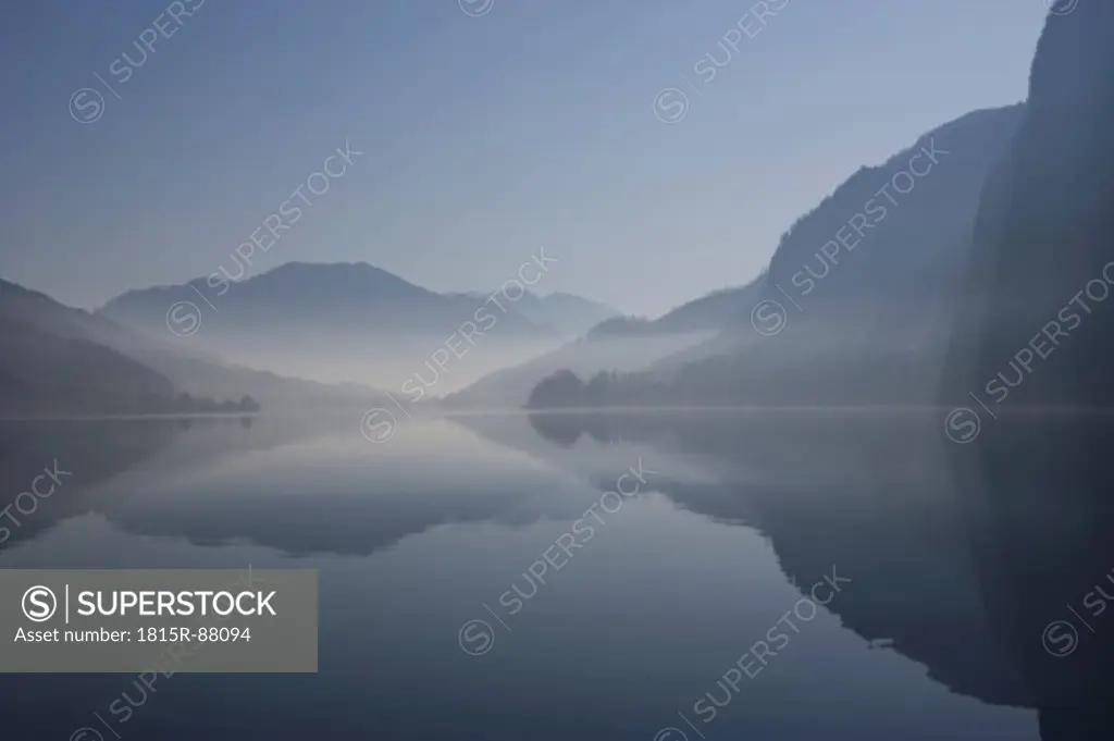 Austria, Mondsee, View of foggy morning near lake
