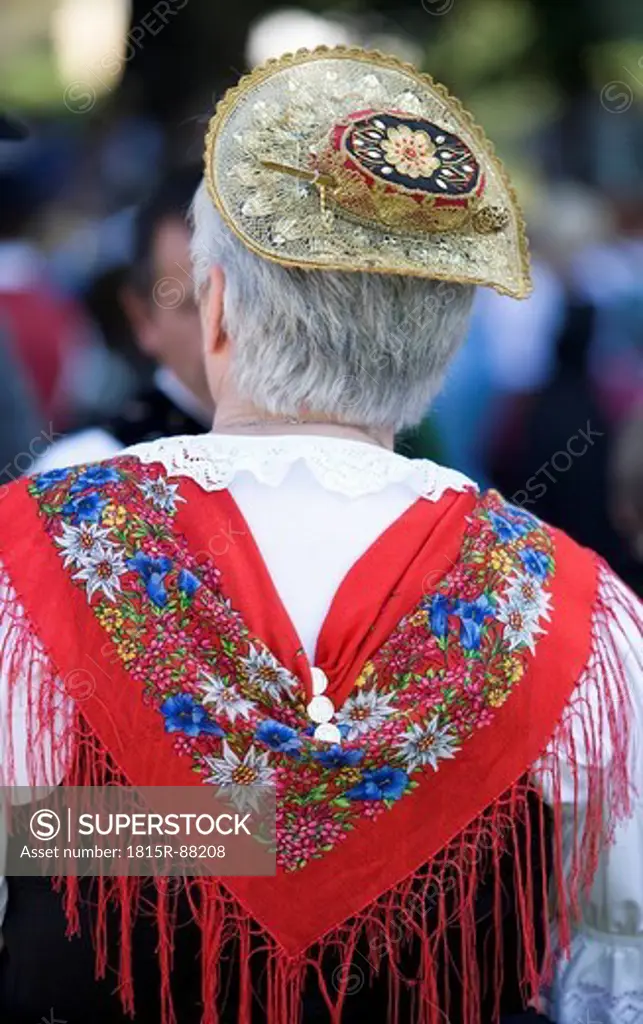 Austria, Salzburg, Senior woman wearing traditional costume and hat