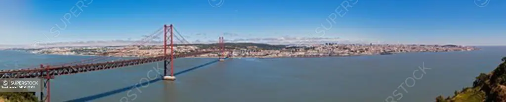 Europe, Portugal, Lisbon, Almada, View of suspension bridge with river Tagus