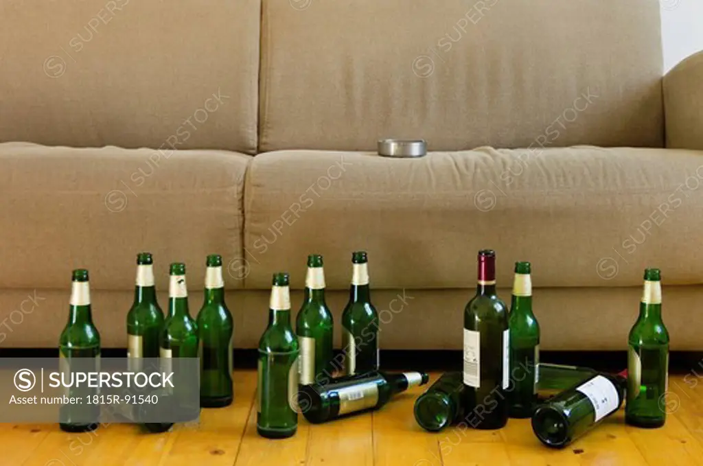 Germany, Hessen, Frankfurt, Sofa with empty beer bottles