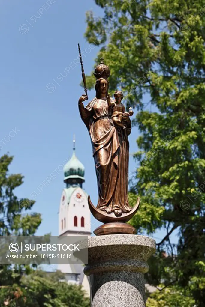 Germany, Bavaria, Upper Bavaria, Rosenheim, View of Virgin Mary statue at Riedergarten gardens