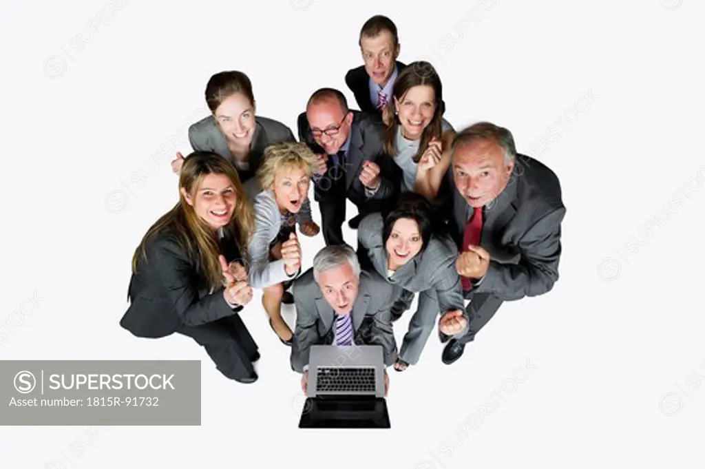 Business people with laptop against white background, portrait