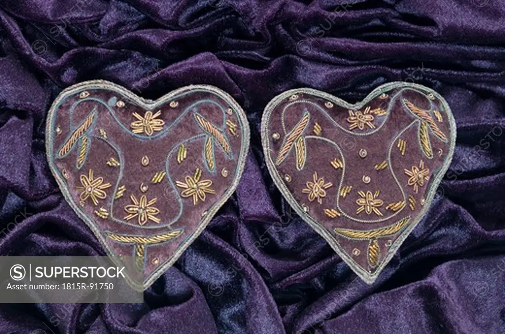Heart shape with embroidery on velvet
