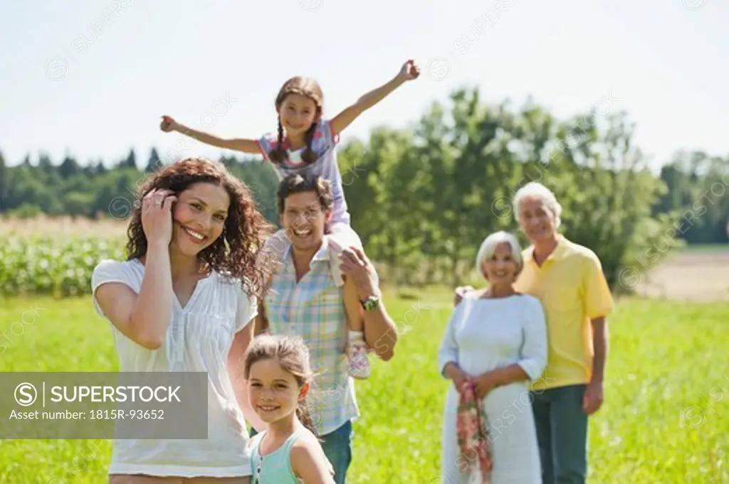 Germany, Bavaria, Family together having picnic, smiling