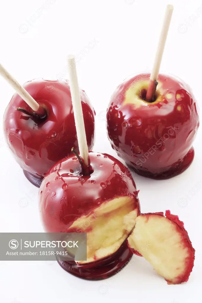 Candied apple on stick, close-up