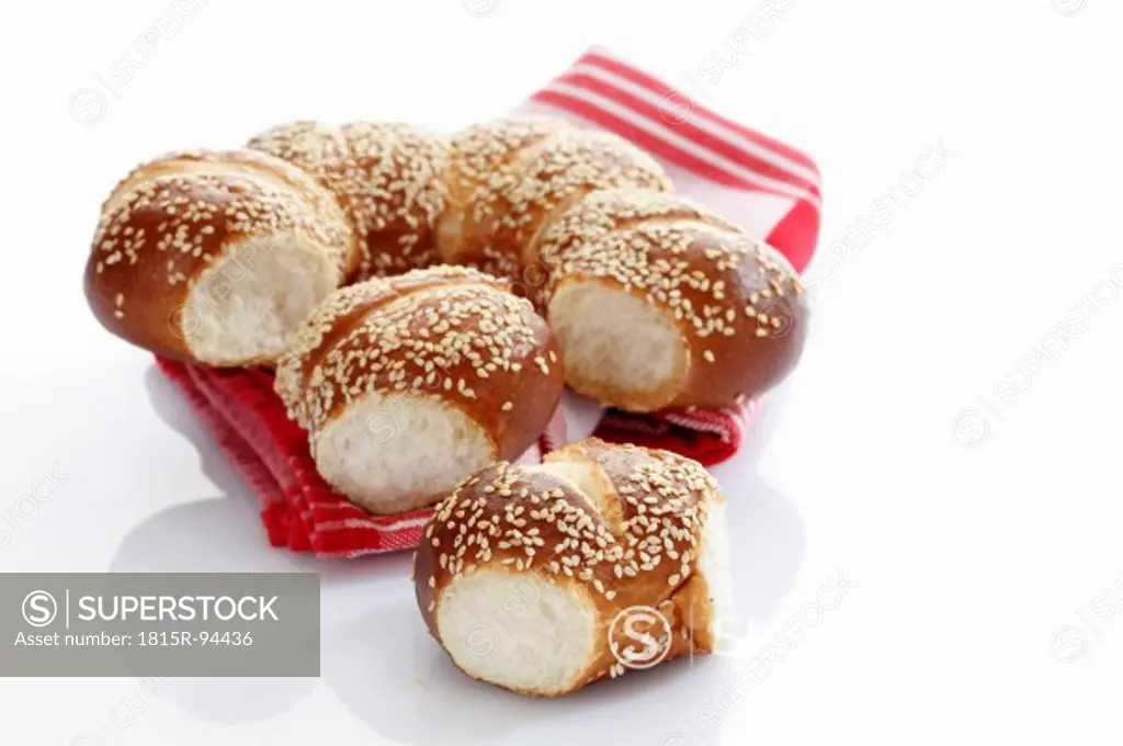 Pretzel wrath with sesame seed on white background, close up